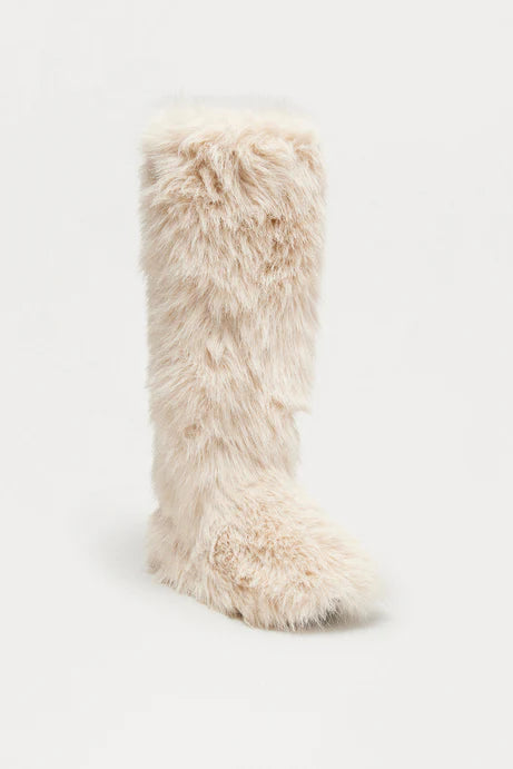 Bottes en fausse fourrure au coin du feu - Beige