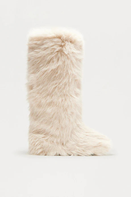 Bottes en fausse fourrure au coin du feu - Beige