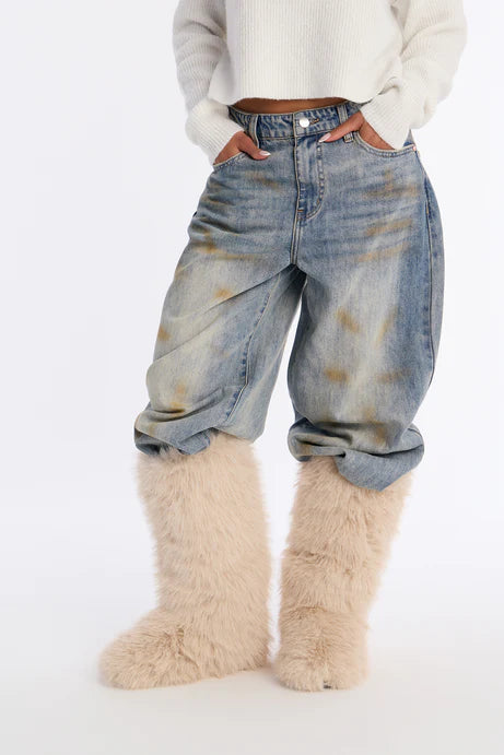 Bottes en fausse fourrure au coin du feu - Beige